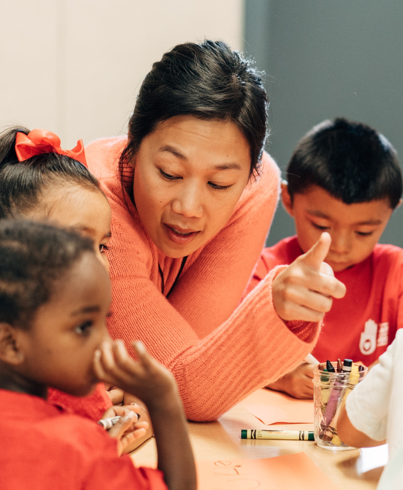 CZI Co-founder and Co-CEO Priscilla Chan with children at The Primary School, which she founded in East Palo Alto (Education).