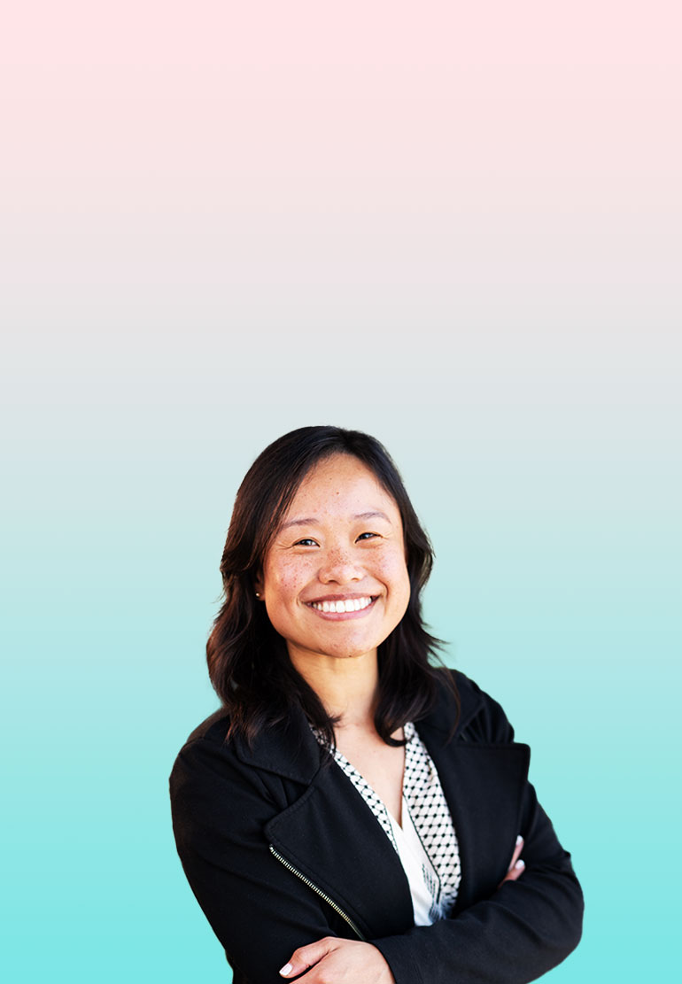 A headshot of CZI housing affordability manager Michelle crossing her arms and smiling.