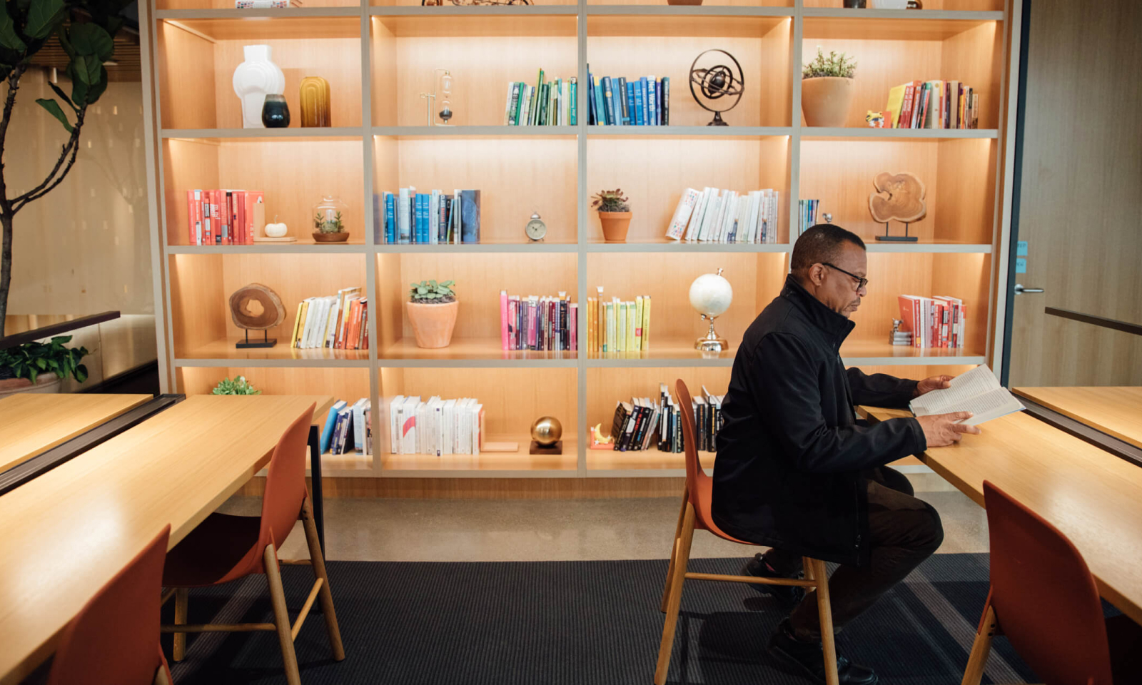 Aly Tamboura, Justice & Opportunity, in the library at CZI's office.