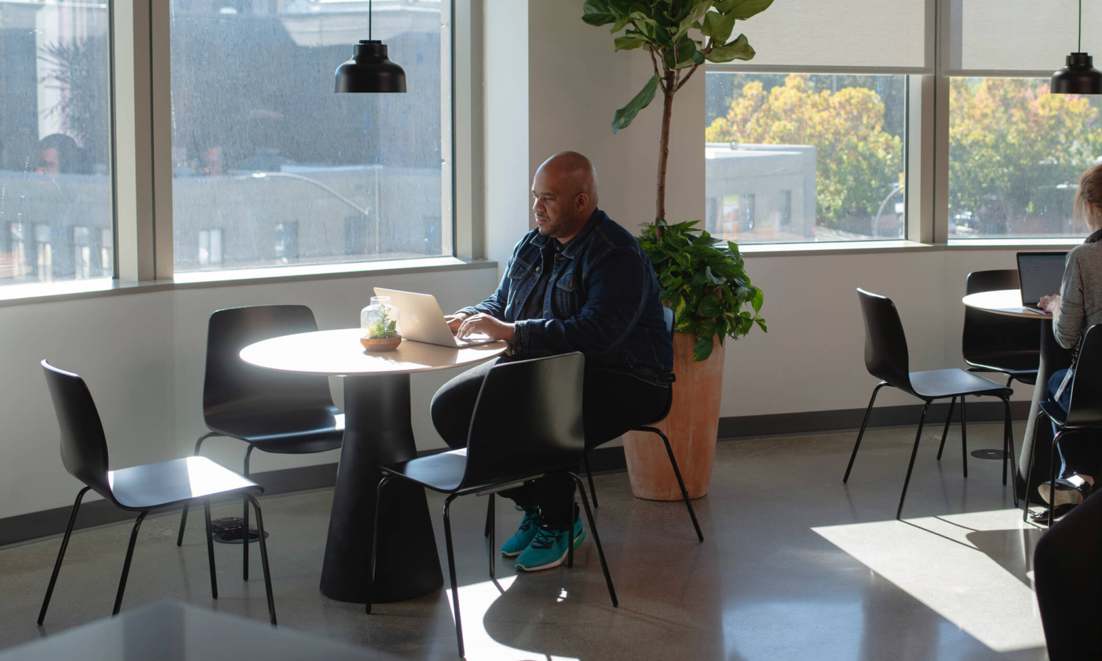 Maurice Wilkins, Diversity, Equity, and Inclusion Manager, in the library at CZI's office.