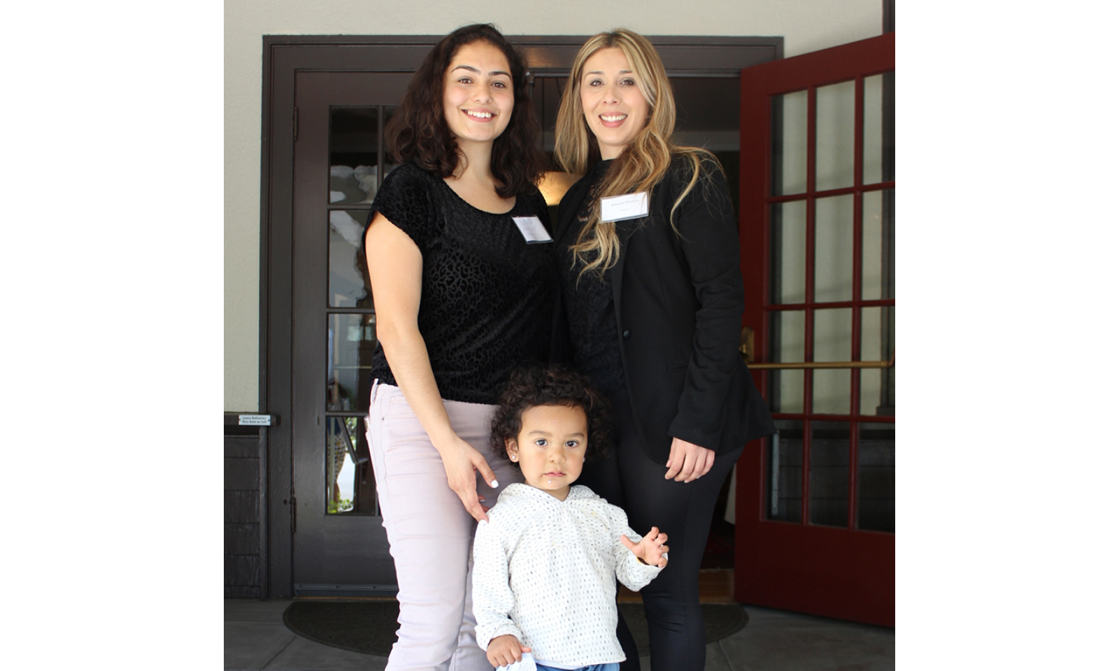 LiveAble graduate Nicole celebrates with her Able Works coach, Blanca Medina, and son, in East Palo Alto. The LiveAble program helps women achieve financial stability,