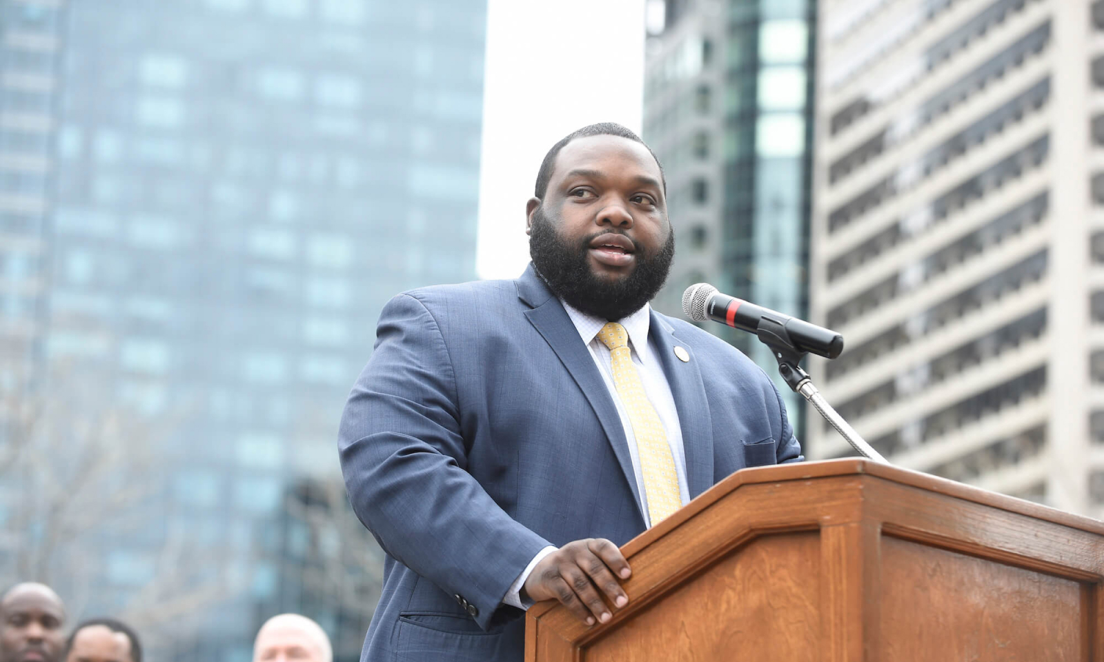 Rep. Jordan A. Harris speaking at a press conference