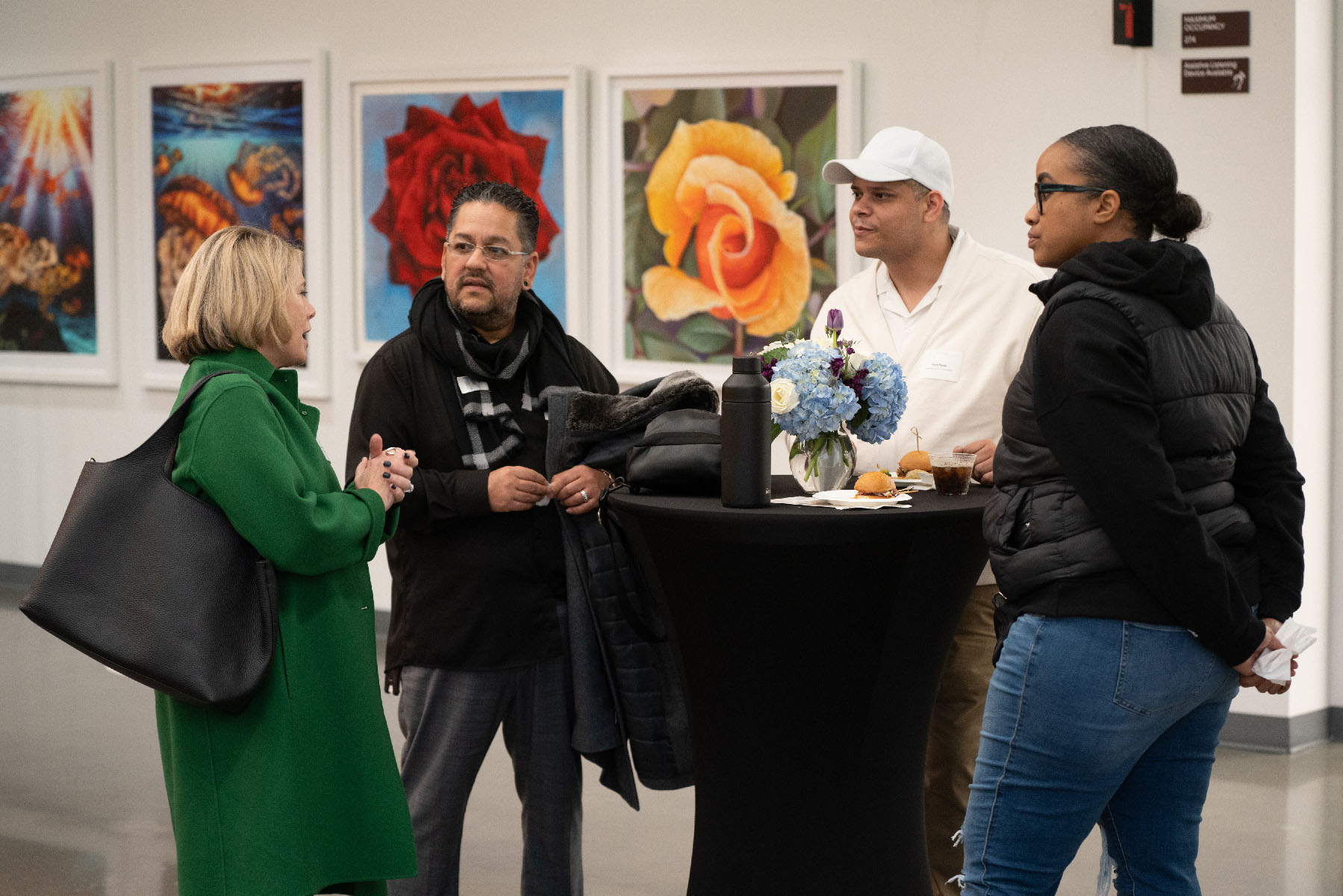 Guests network and connect during an Open House at the CZI Community Space on January 18, 2024.
